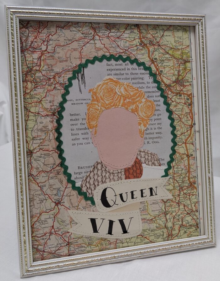 Vintage whote frames paper and stich portrait of Vivence Westwood. Backed on vintage OS map of the region of England she hails from. Simple portrait of Viv is surounded by green rick rak and finished with tattoo style ribbon banner which says Queen Viv